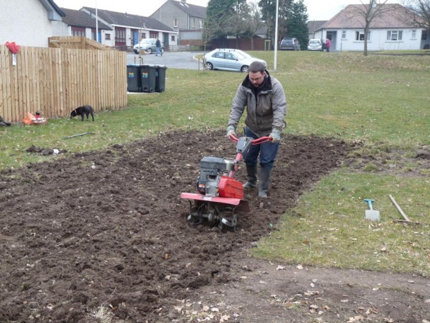 Rab rotavating the soil